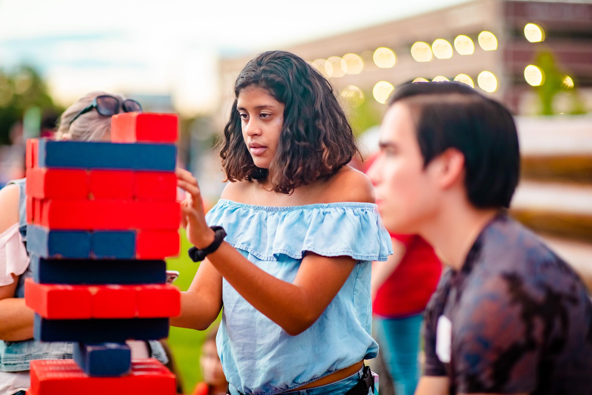 Students playing Jenga